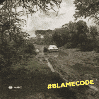 a black and white photo of a car on a muddy road with #blamecode on the bottom