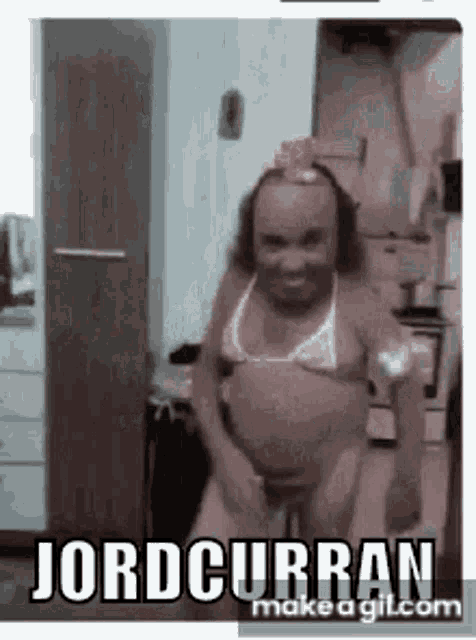 a woman in a bikini is dancing in a kitchen with the words jordcurran written on the bottom .