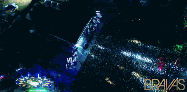 an aerial view of bravas festival with a crowd of people