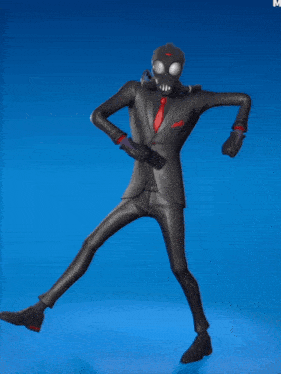 a man in a suit and gas mask is dancing
