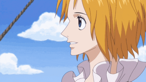 a close up of a girl 's face against a blue sky