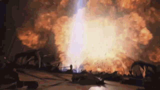 a large explosion with a lot of fire coming out of it