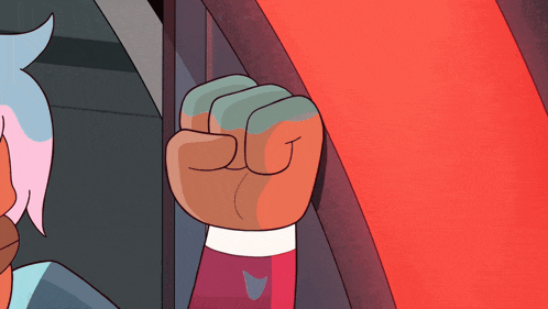 a close up of a person 's fist with a red background