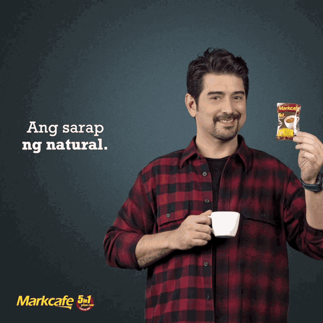 a man in a plaid shirt is holding a cup of coffee