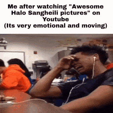 a man is crying in a classroom while watching awesome halo sangheli pictures on youtube