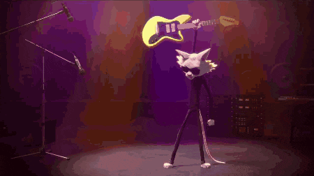 a cat playing a guitar on a stage with green lights behind it
