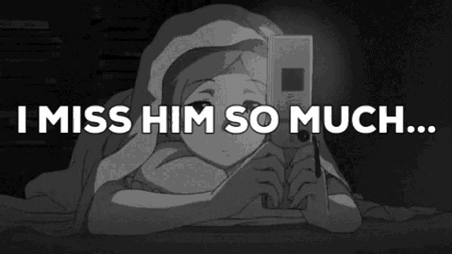 a girl is laying under a blanket with a cell phone and the words " i miss him so much "