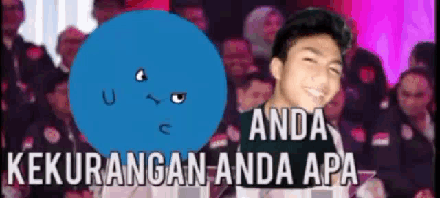 a man is standing in front of a crowd with the words " anda kekurangan anda apa "