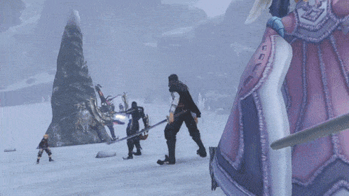 a group of people are standing in a snowy area and one of them has a sword