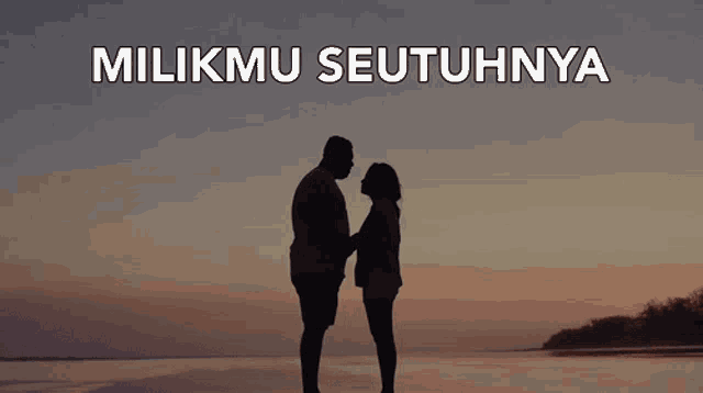 a silhouette of a man and woman holding hands with the words milikmu seutuhnya behind them