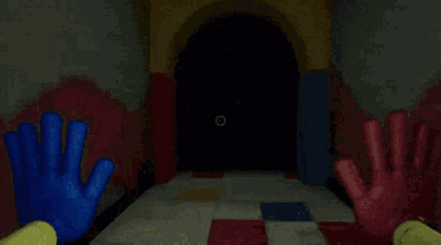 a blue hand and a red hand are reaching out towards a monster in a video game