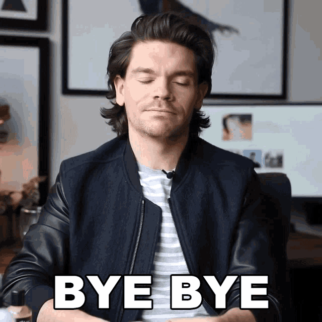 a man with his eyes closed says bye bye with his hands folded