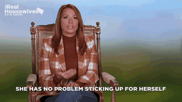 a woman sitting in a chair with the words " she has no problem sticking up for herself " below her