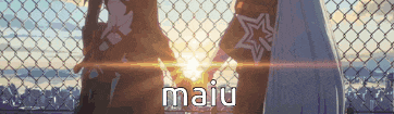 a couple of anime characters standing next to each other with the word maiu on the bottom right