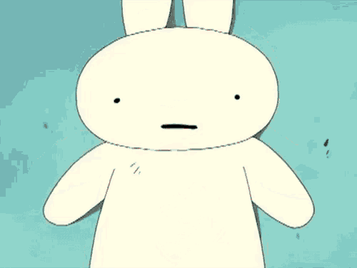 a close up of a cartoon character holding a piece of paper .