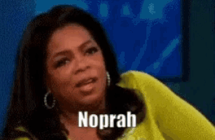 a woman in a yellow sweater says noprah on her face