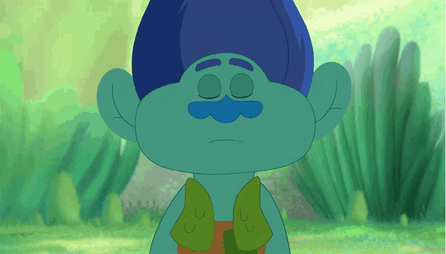 a troll with blue hair and a blue mustache is standing in the grass with his eyes closed