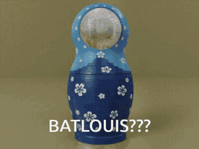 three russian nesting dolls are standing next to each other with bat louis written on the bottom