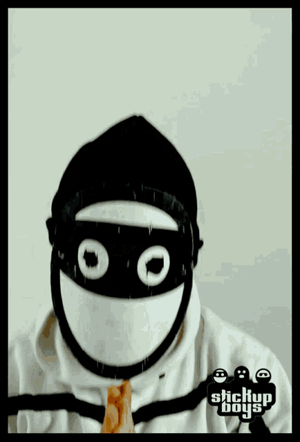 a picture of a person wearing a mask and the words stickup boys