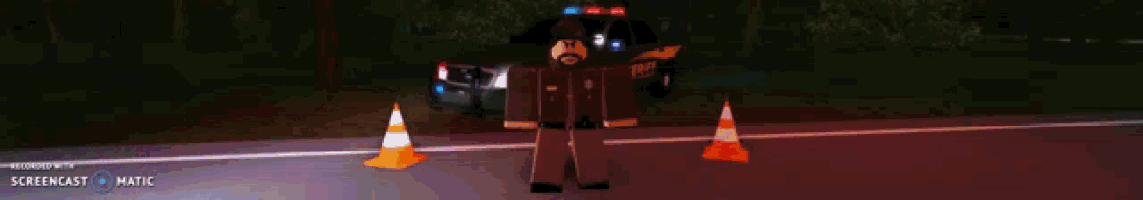 a man in a police uniform is standing on the side of a road