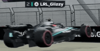 a race car with the name lrl glizzy on the side of it