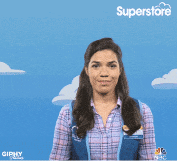 a woman in a superstore uniform waving her hand