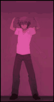 a man in a white shirt and black pants is standing in front of a pink wall .