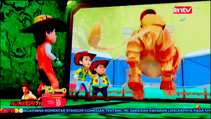 a tv screen shows a cartoon of a cowboy and a robot