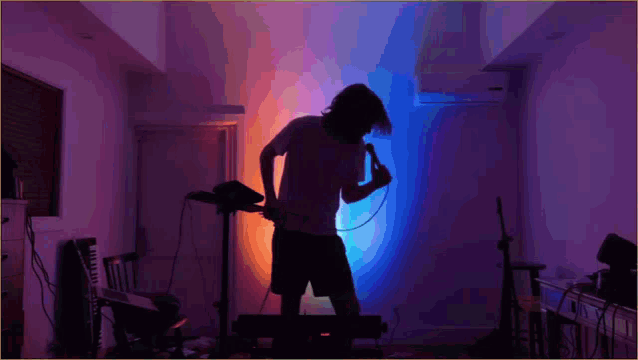 a man singing into a microphone with the words " big ol motherfucking duffel bag of shit " next to him