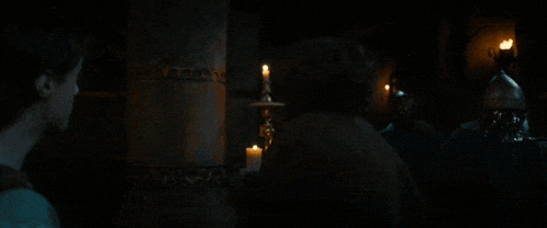 a blurry picture of a man 's face in the dark