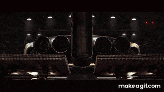 a person 's feet are sticking out of a curtain in a hallway with the words make a gif.com below it