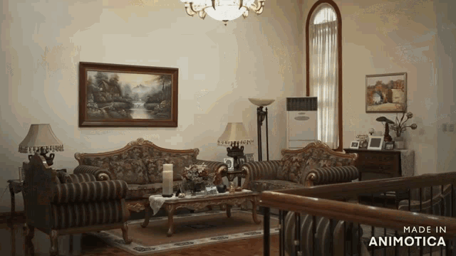 a living room with a painting on the wall and the words made in animotica at the bottom