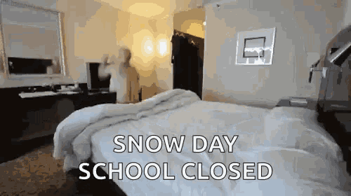 a room with a bed and the words snow day school closed
