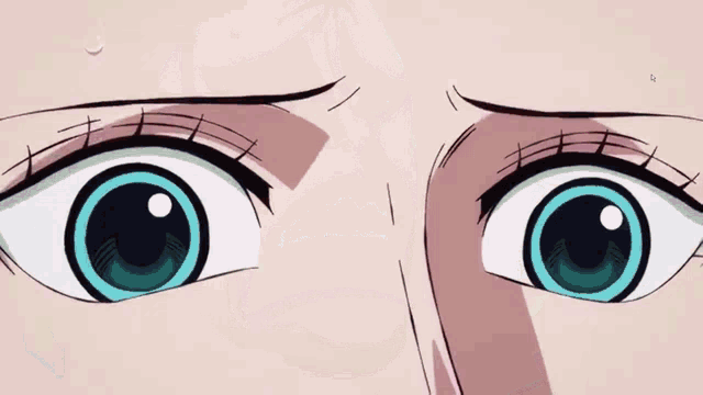 a close up of a person 's mouth with a tear coming out of it