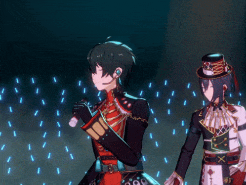 a man in a top hat is holding a microphone while another person stands behind him