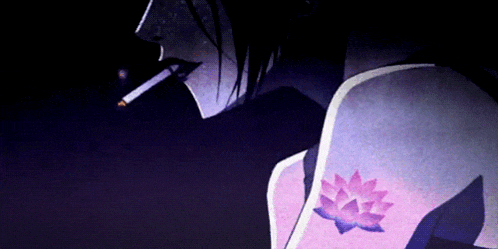 a person with a tattoo of a lotus flower on their arm is smoking a cigarette