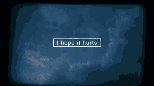 a sign that says i hope it hurts against a cloudy sky
