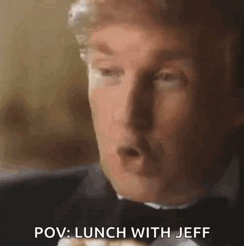 a man in a tuxedo is talking to another man and says `` pov : lunch with jeff '' .