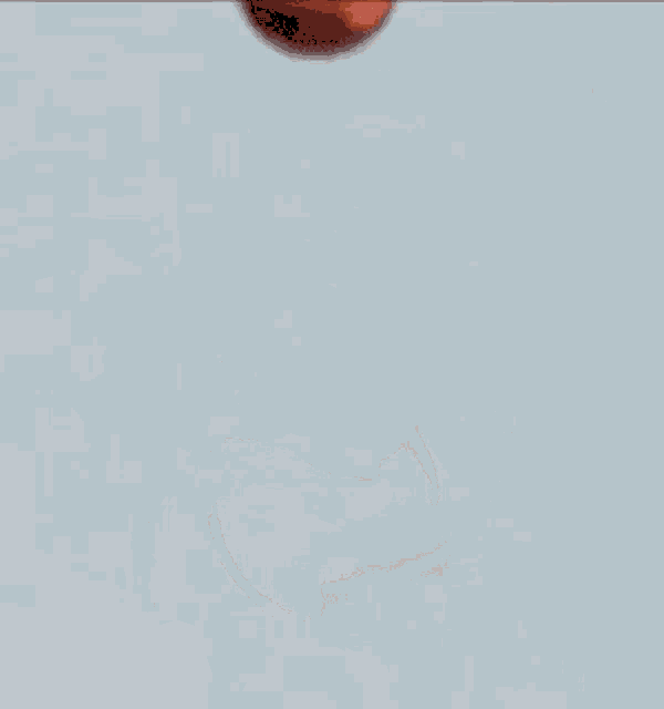 a drawing of a circle of orange liquid on a white surface
