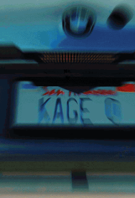 a blurry image of a license plate that says kage on it