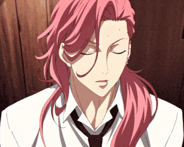 a man with pink hair and a white shirt and tie