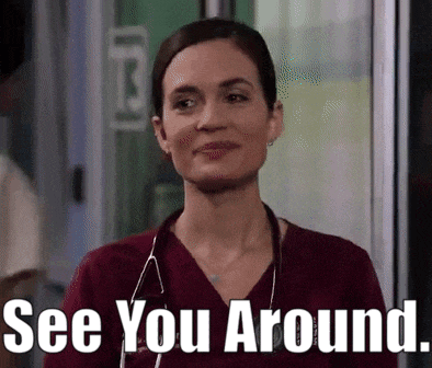 a woman in a scrub top with a stethoscope around her neck is smiling and says see you around .