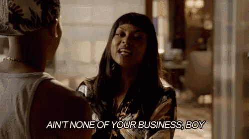 a woman is talking to a man in a room and says `` ain 't none of your business , boy ''