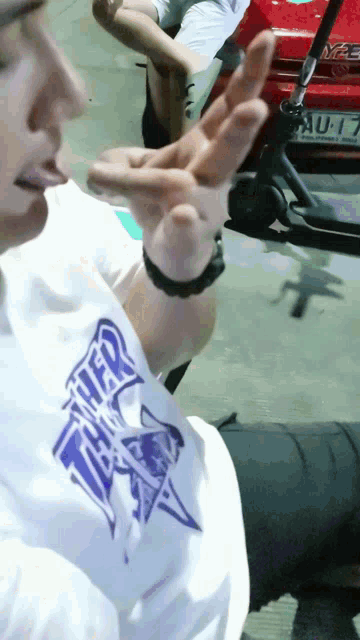 a man wearing a shirt that says thunder thunder
