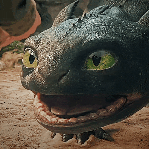 a close up of a dragon 's face with its mouth wide open