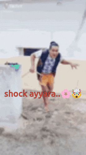 a blurry picture of a man with the words shock ayyara on the bottom right