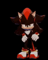 shadow the hedgehog from the video game sonic the hedgehog is standing on a black background and pointing at something .