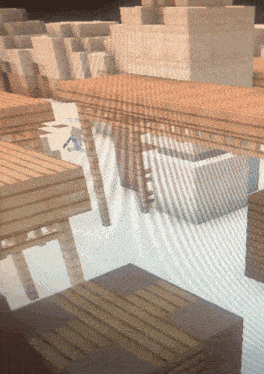a computer screen displays a minecraft game with a few buildings