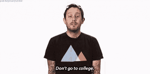 a man with a beard is wearing a black shirt that says " don 't go to college "