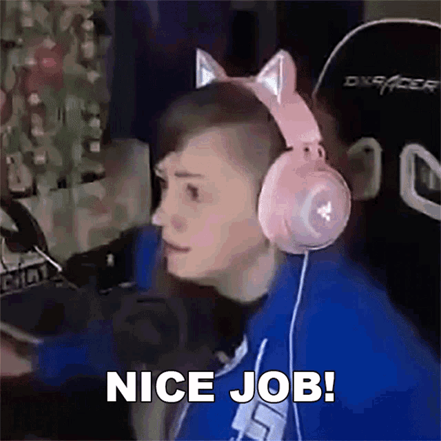a person wearing headphones and a cat ear headband says " nice job "